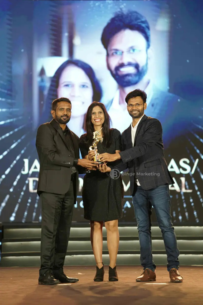 Dr. Uma and Jagan receiving an award